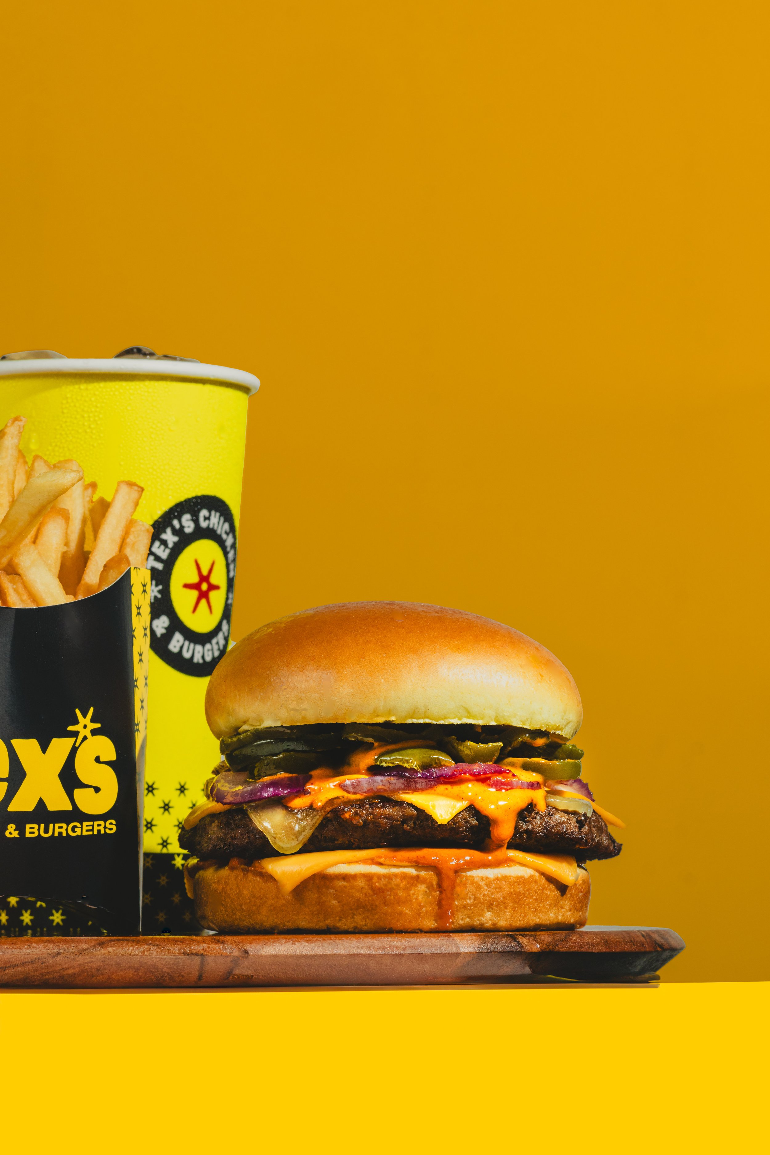Brand Photography for Eat Texas Chicken and Burgers franchise located across multiple boroughs in New York City. 
Located by NYC based Food Product Photographer Kyran John of Foreign Kollective Media Group. 