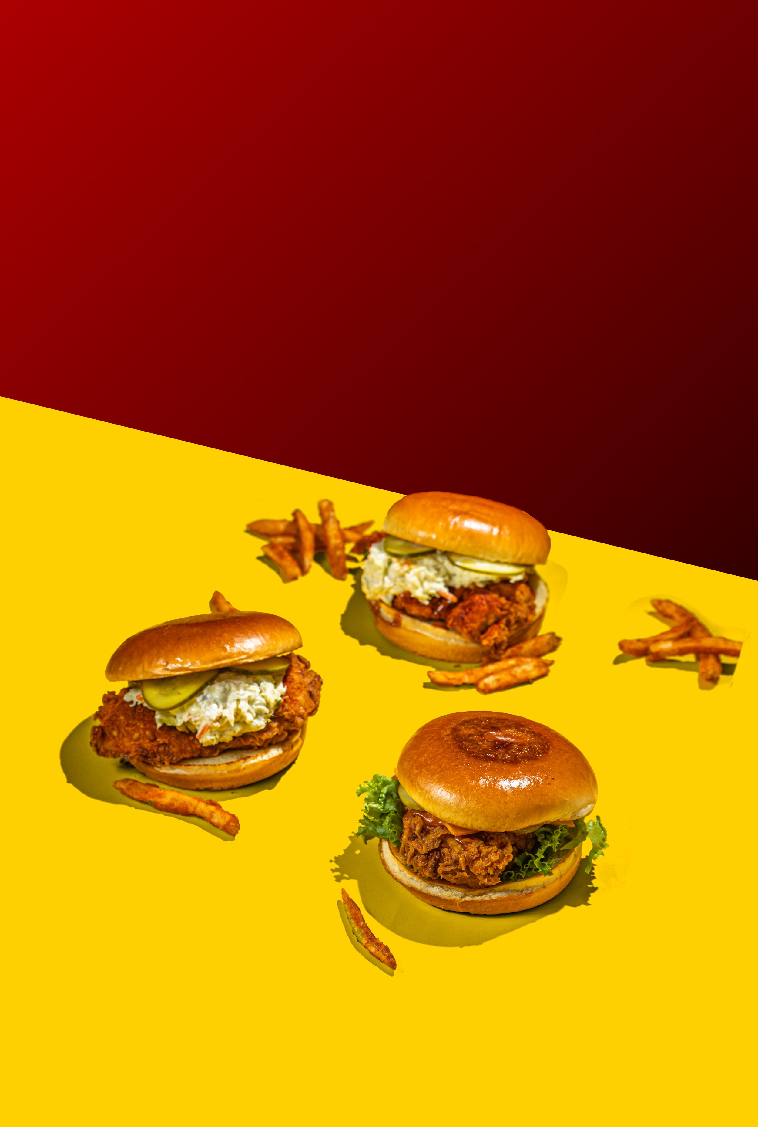 Photo variety of burgers taken by NYC Food Photographer Kyran John for Blazing Chicken and Gyro in Brooklyn New York.